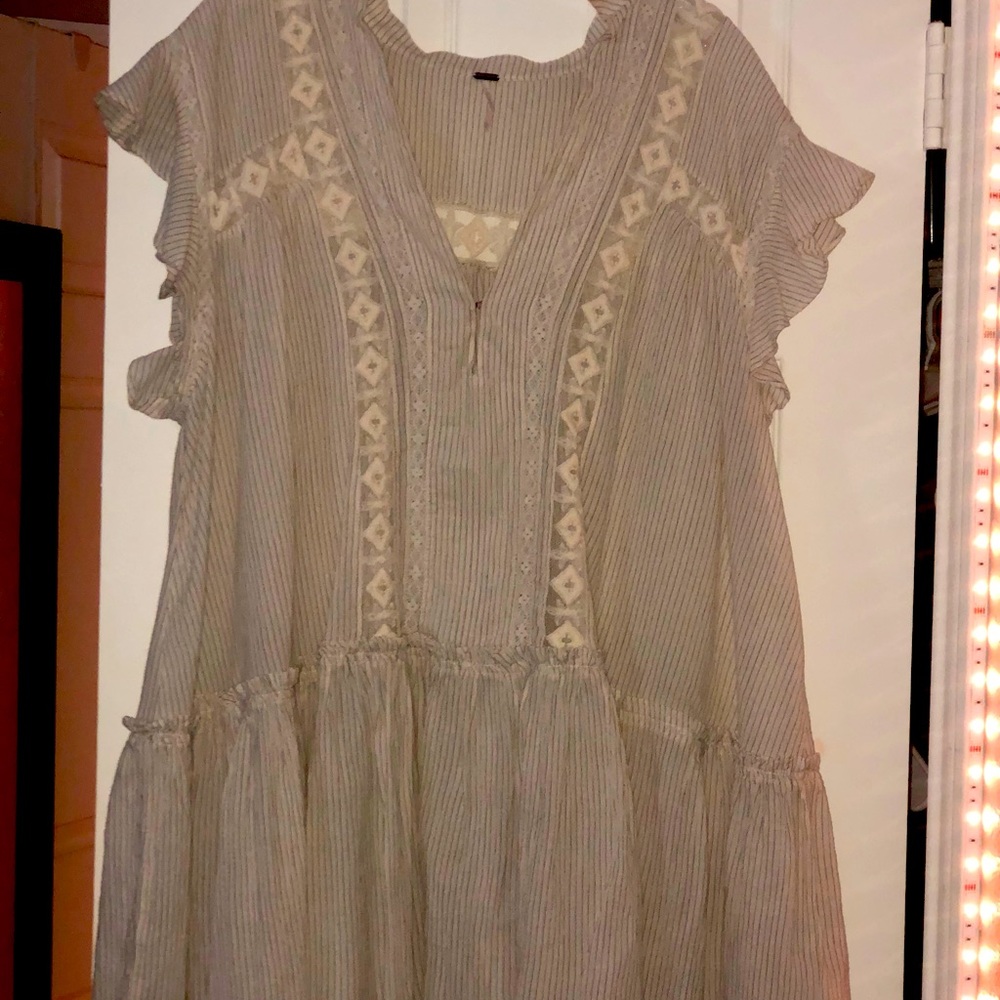 Cute tunic, never worn, size Large. Brand Free People